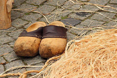 brown sandals beside brown rope thumbnail