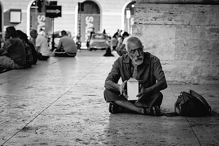 man sitting down on floor thumbnail