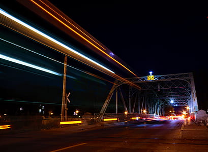 landscape photography of lighted suspension bridge thumbnail