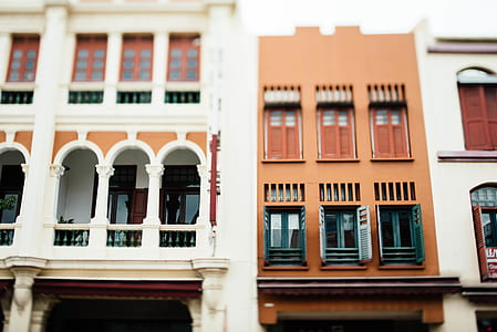brown and white building at daytime thumbnail