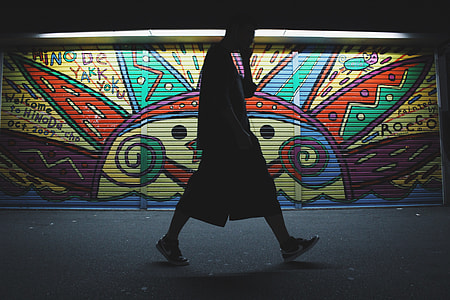 man walking near establishment thumbnail