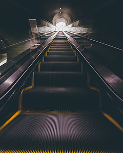 low angle photography of black escalator thumbnail