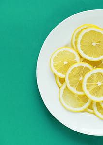 Slices of Lemon on White Plate thumbnail