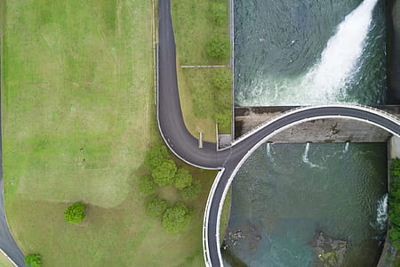 aerial photography of bridge and green grass thumbnail