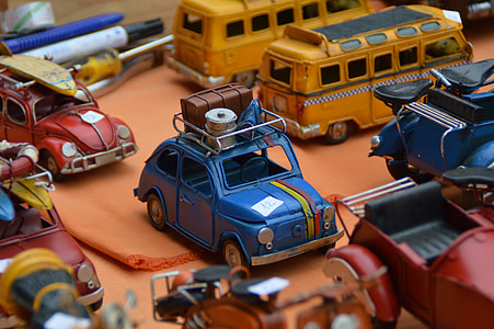 selective focus photography of blue car toy thumbnail