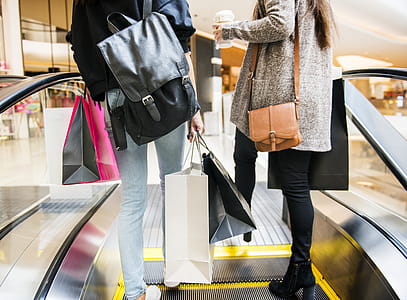 Two Woman Standing On Escalator thumbnail