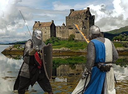 two men wearing armor with castle background thumbnail