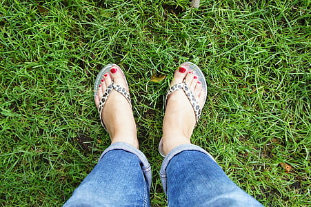 woman standing on grass thumbnail