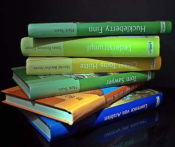 pile several assorted-title books thumbnail