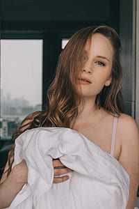 woman wearing spaghetti strap top thumbnail