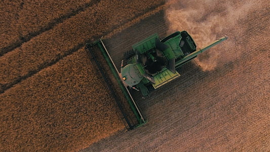 aerial photography of green harvester thumbnail