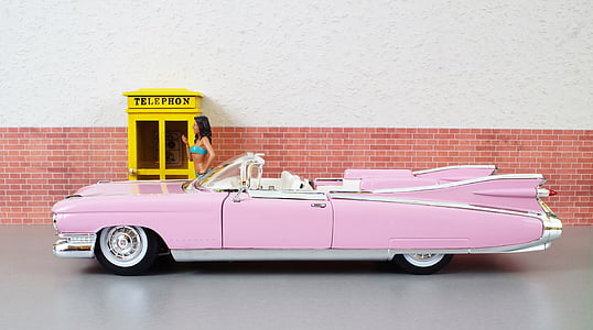woman standing bear pink convertible car thumbnail