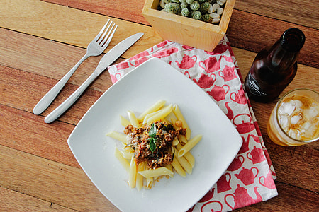 pasta with sauce on white plate thumbnail