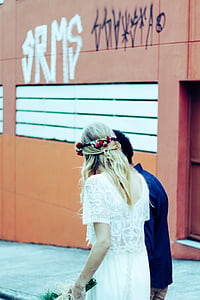 couple walking on streets thumbnail