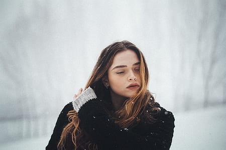 woman in black sweater thumbnail