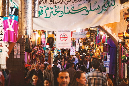 people walking in between stores thumbnail