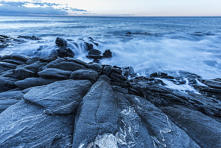 sea waves splashing on rock thumbnail