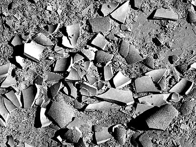 broken vase in grayscale photography thumbnail