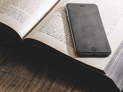 space gray iPhone 5s on book page thumbnail