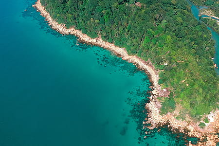 Aerial Photo of Island With Green Trees at Daytime thumbnail