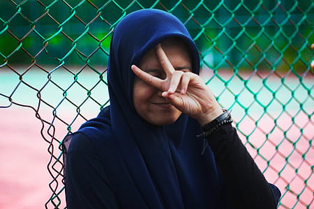 Woman Wearing Blue Hijab thumbnail