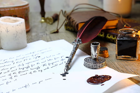 silver fountain pen on white paper thumbnail