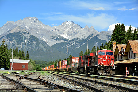 red train photo during daytime thumbnail