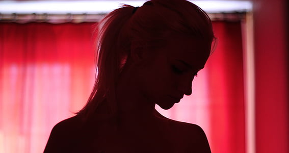 silhouette of woman in pony tail thumbnail
