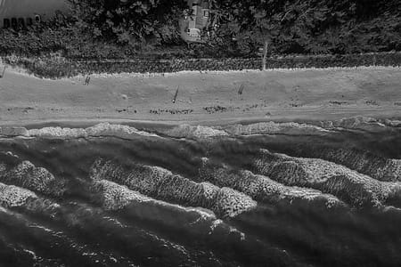 Bird's-view and Grayscale Photography of Body of Water thumbnail
