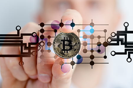 person holding bitcoin thumbnail