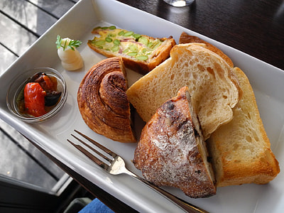 pastries served on white ceramic tray thumbnail