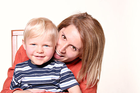 mother holding child thumbnail