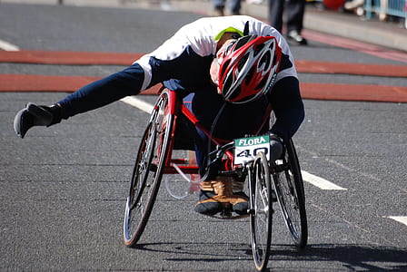 man cycling on asphalt road thumbnail