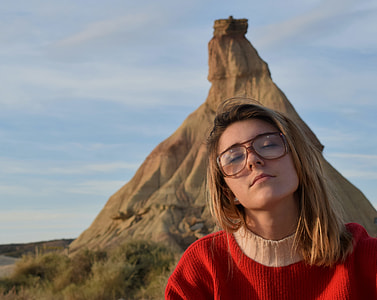 woman taking selfie with background of mountain range thumbnail