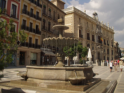 brown concrete water fountain at day time thumbnail