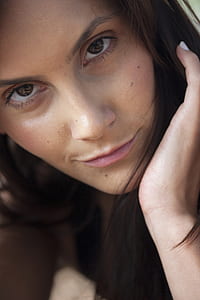 close-up photography of woman's face thumbnail
