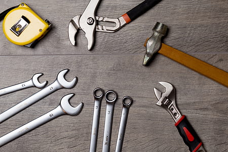 gray steel wrench kit on gray wooden top thumbnail