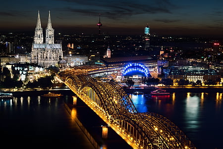 birds eye view of bridge and city during night time thumbnail