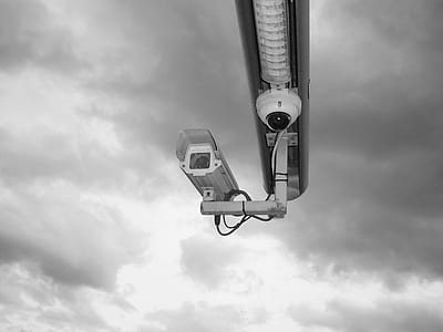 grayscale photo of surveillance cameras thumbnail