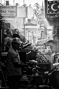 greyscale photo of people walking on street during daytime thumbnail