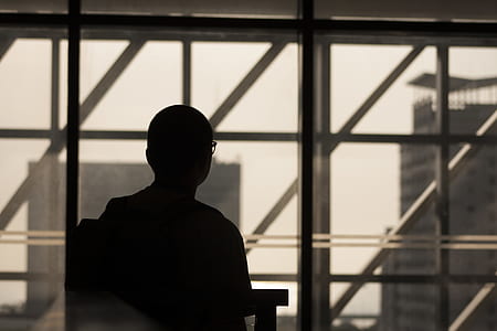 silhouette of person sitting on chair thumbnail