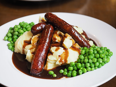 white ceramic plate with sausages thumbnail
