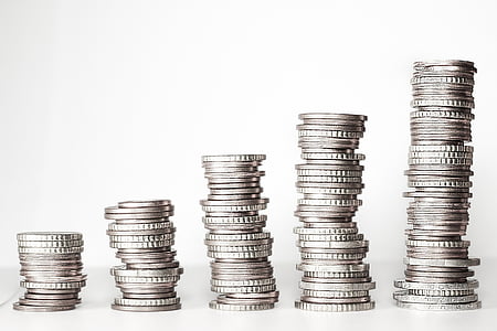five piles of silver-colored coin thumbnail