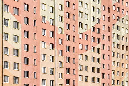 beige and orange concrete building thumbnail