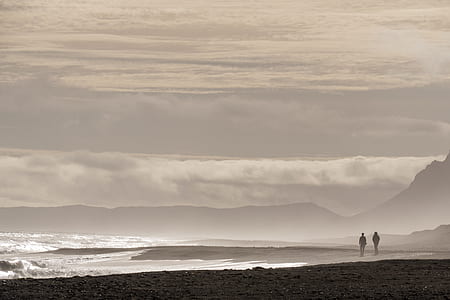 two people walking at the beach thumbnail