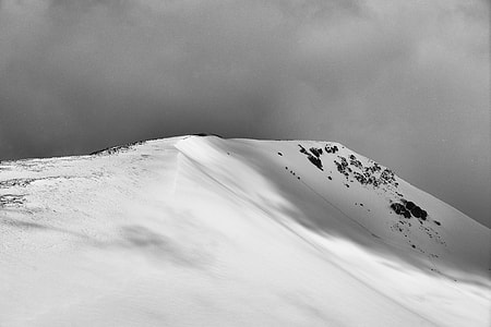 dark clouds over alp mountain thumbnail
