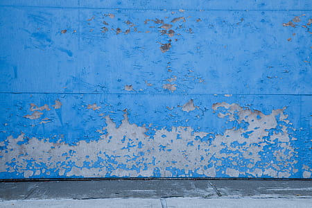 blue painted wall during daytime thumbnail