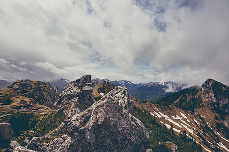 mountains under white clouds thumbnail