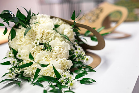 Beautiful bouquet of white flowers on a table thumbnail