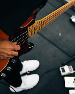person playing bass guitar thumbnail